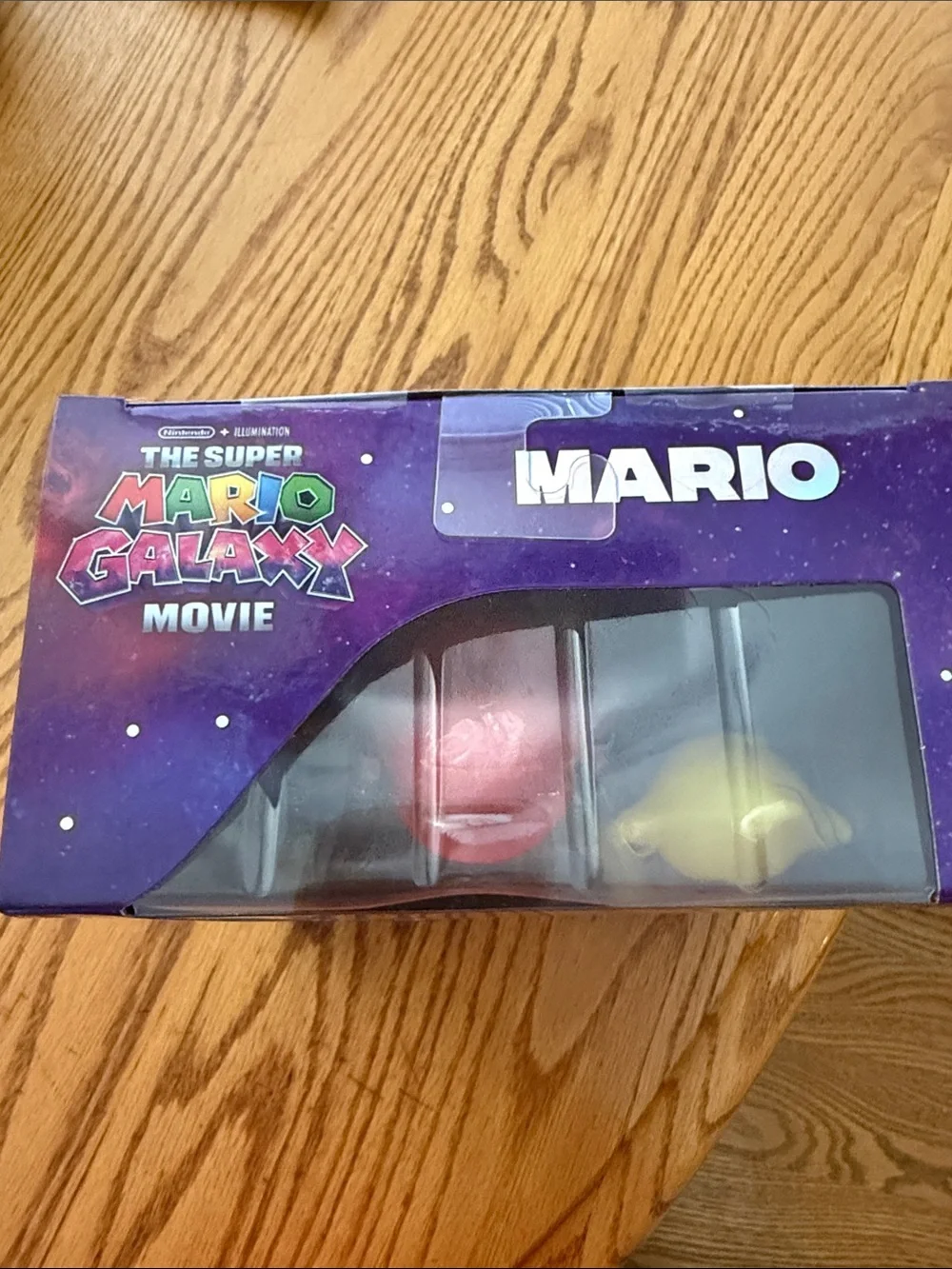Nintendo Mario Figure with Red Hat, Blue Overalls and Yellow Luma
